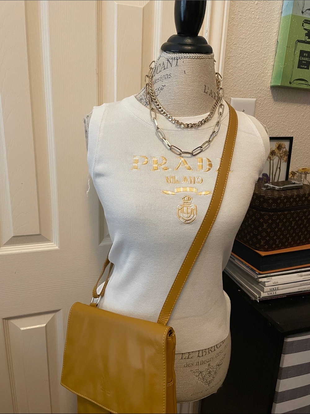 Beautiful White Sleeveless Embroidered Logo Tank. Closet clear out no returns.